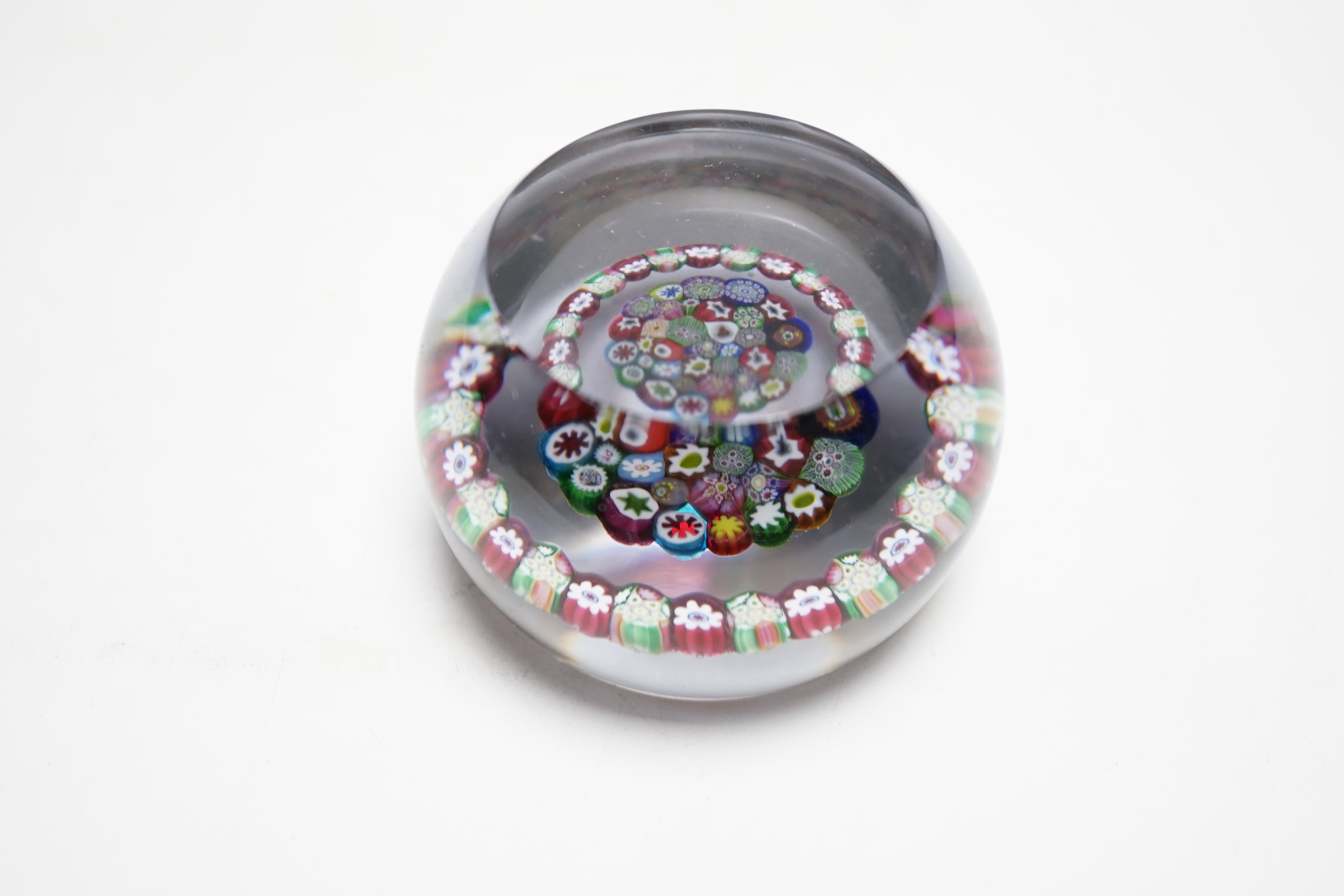 A Paul Ysart concentric millefiori garland glass paperweight, Harland period, ‘PY’ cane, 7.5cm